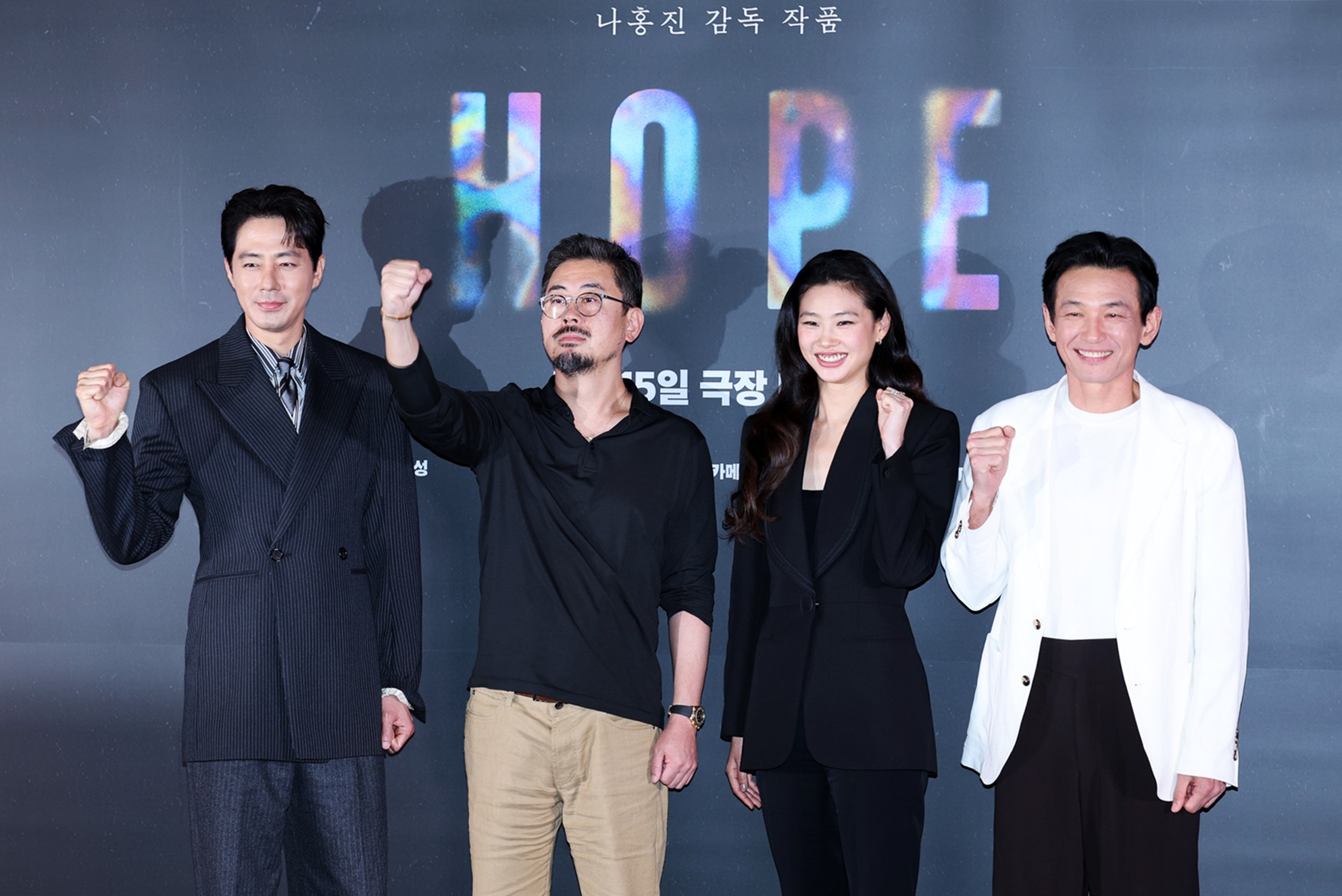 Actor Zo In-sung (from left), director Na Hong-jin, and actors Jung Ho-yeon and Hwang Jung-min on July 6 pose for photos at a media screening and news conference for the science-fiction thriller 