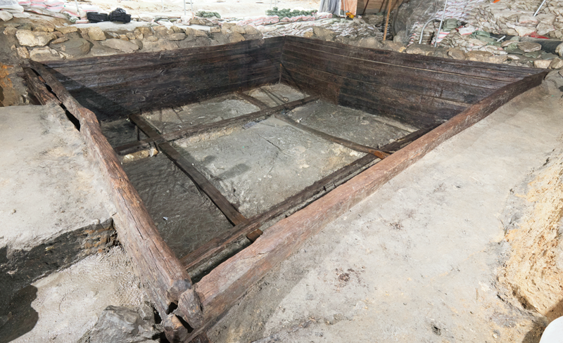Excavated wooden water reservoir beneath stone rampart at Jangmisanseong Fortress in Chungju, Chungcheongbuk-do Province
