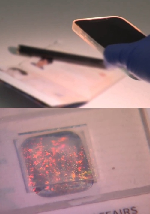 A smartphone flashlight (top) shines on the nano-fingerprint security label attached to a passport, while a flashlight (bottom) creates a unique reflective pattern.