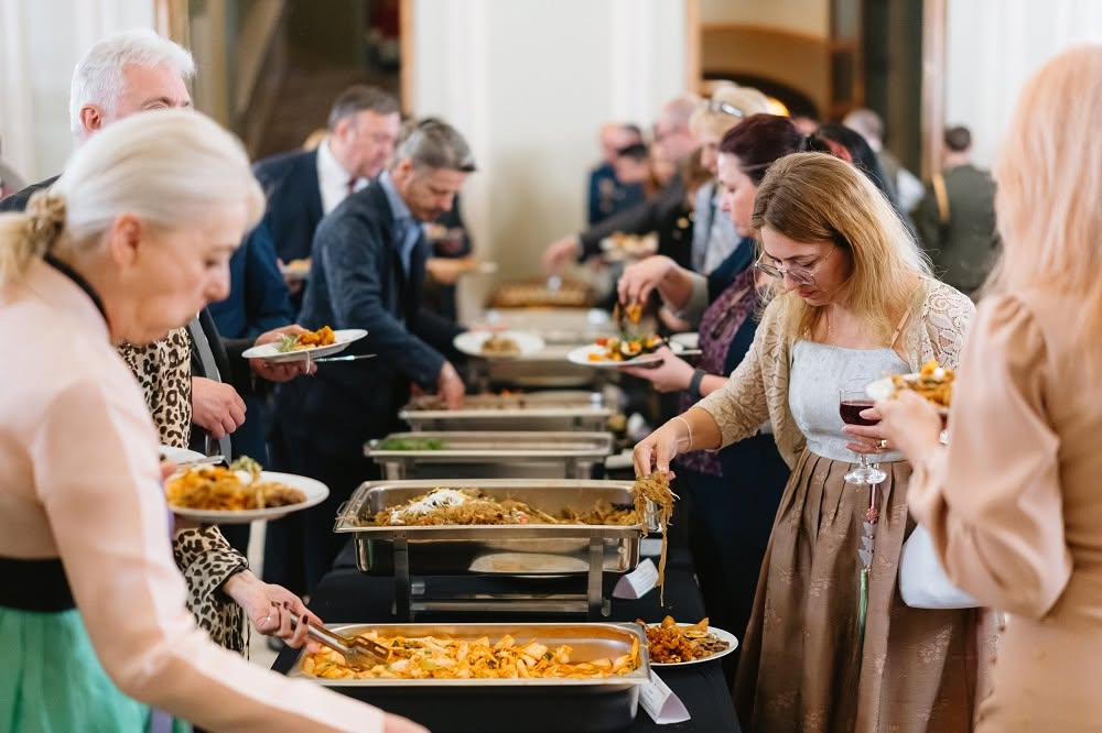 Guests on Oct. 6 try Hansik (Korean cuisine) during the National Foundation Day celebration held at the Bucharest National Opera House in Bucharest, Romania