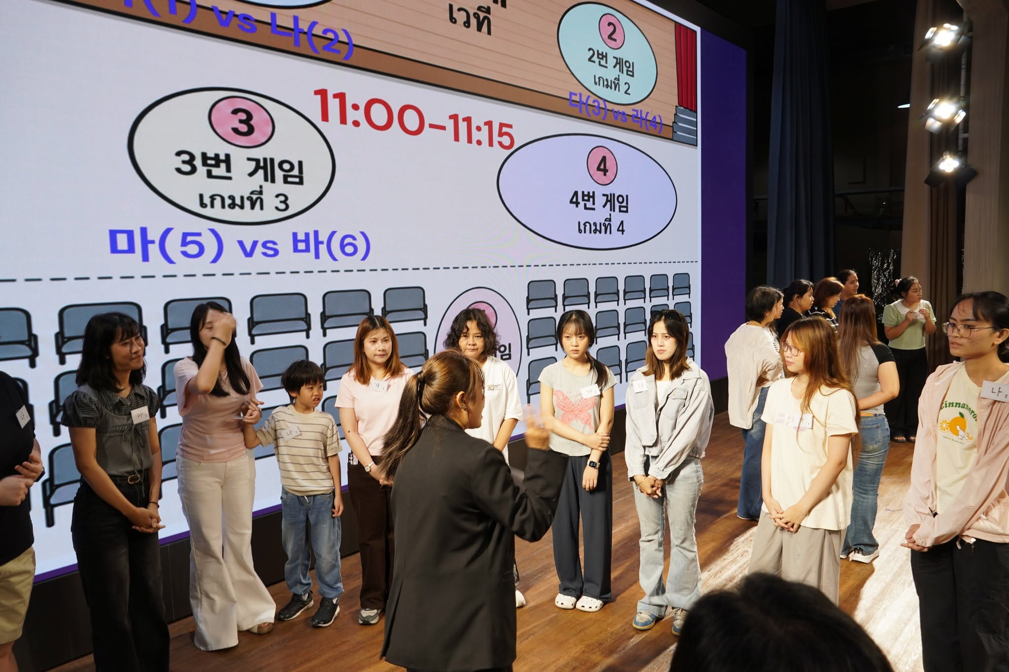 Participants on Oct. 10 gather on stage to take part in interactive games during the Hangeul Day celebration at the Suan Sunandha Rajabhat University in Bangkok. 
