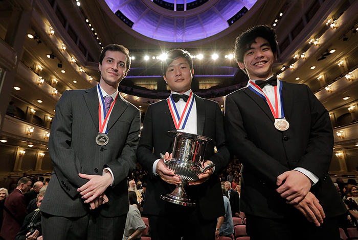 Pianist Yekwon Sunwoo (center) takes the gold in the Van Cliburn competition, in the Bass Performance Hall in Fort Worth, Texas, on June 10. Silver medalist Kenneth Broberg (left) and bronze medalist Daniel Hsu, both from the U.S., are also winners this year. (Van Cliburn Foundation)