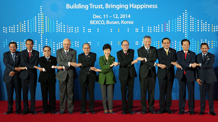 President Park Geun-hye poses for official group photos with leaders of the ASEAN member states at the ASEAN-ROK Commemorative Summit in Busan on December 12.