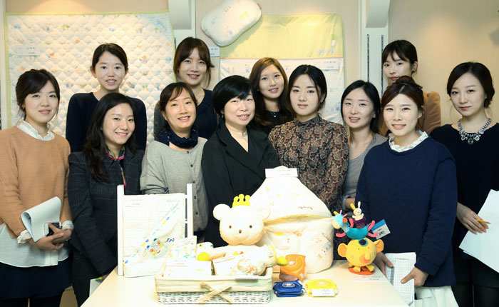 Designers in Agabang's fashion design department pose for a photo. Their goal is to make products which have all three of the company's core values: good design, quality and convenience.