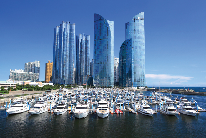 (Top) The Sinseondae Port of Busan. (Bottom) Marine City in Haeundae District, Busan. (photos courtesy of the KCC, Australia)