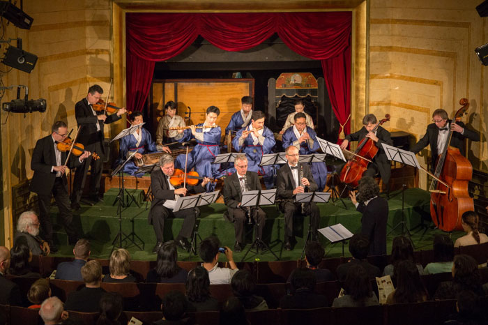 Musicians from the National Gugak Center and members of the Czech National Symphony Orchestra perform together.