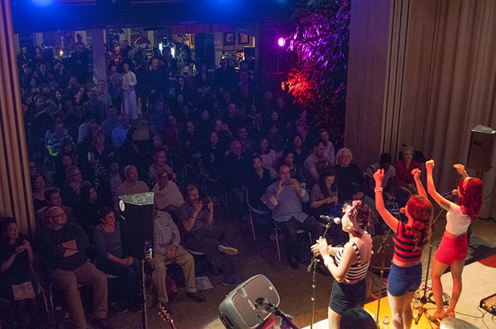 The audience fills the theater to enjoy a performance from The Barberettes on Sept. 5.