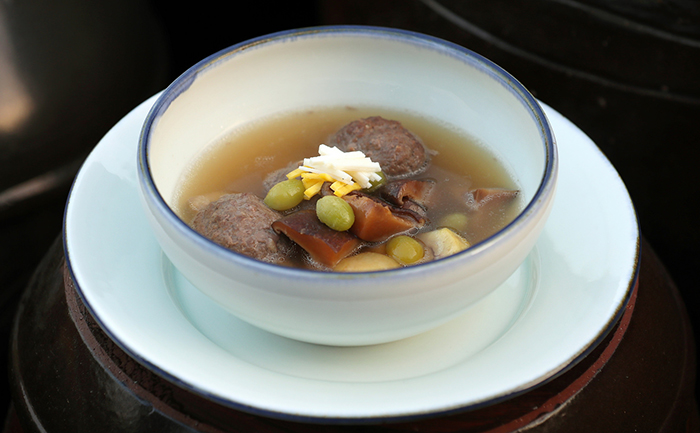 Korean beef short rib patties with soup is a dish combined with <i>tteok galbi</i> beef short ribs in a broth.