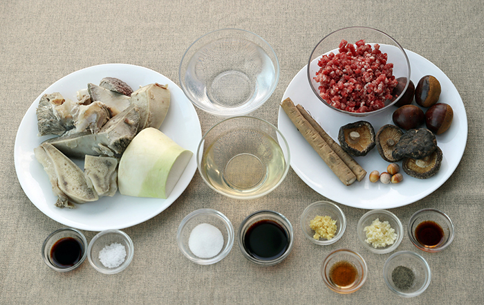 The main ingredients in Korean Beef Short Rib Patties with Soup are short ribs, soy sauce, garlic, ginger, gingko nuts, shitake mushrooms and various seasonings.