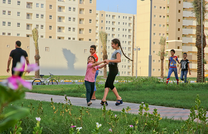 Residents in the newly built 'A Town' at Bismayah New City enjoy their new homes. Hanwha E&C is building the Bismayah New City Project. Currently, about 5,000 households are already occupied.