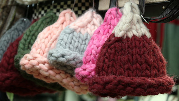 Hand-knitted tuques made from thick wool have caught on this winter. 