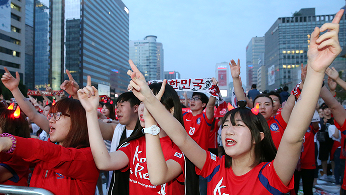  Soccer fans shout out, 