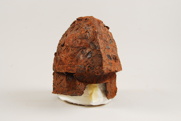 Iron armor (top) and an iron helmet (bottom) found in Gimhae are on display at the Gimhae National Museum.