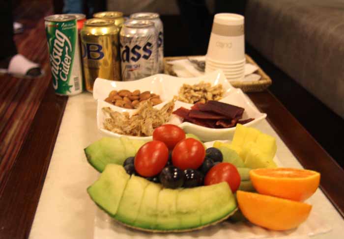 Passengers on the Haerang train are served a generous amount of beverages and food.