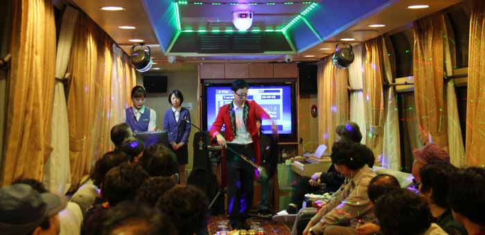 The car attendants double as performers, showcasing a variety of performances, including a cappella singing, a magic show and flute and harmonica performances.