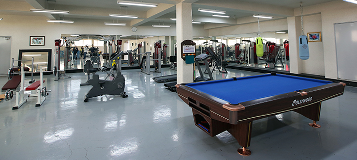 The newly-built factory in the Haman Industrial Complex has a gym, with a pool table, for its workers. 