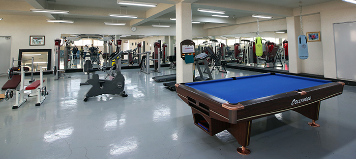 The newly-built factory in the Haman Industrial Complex has a gym, with a pool table, for its workers.