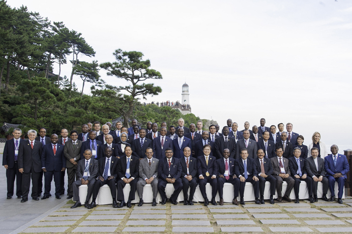 Participants in the ICT Ministerial Meeting in Busan pose for a photo. 