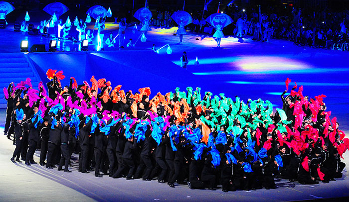 Performers create the logo of the Incheon Asian Para Games 2014.