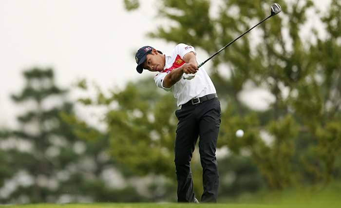 Thai golfer Srithong Natipong hits a T-shot on the 12th hole at the Dream Park Country Club on September 28. 