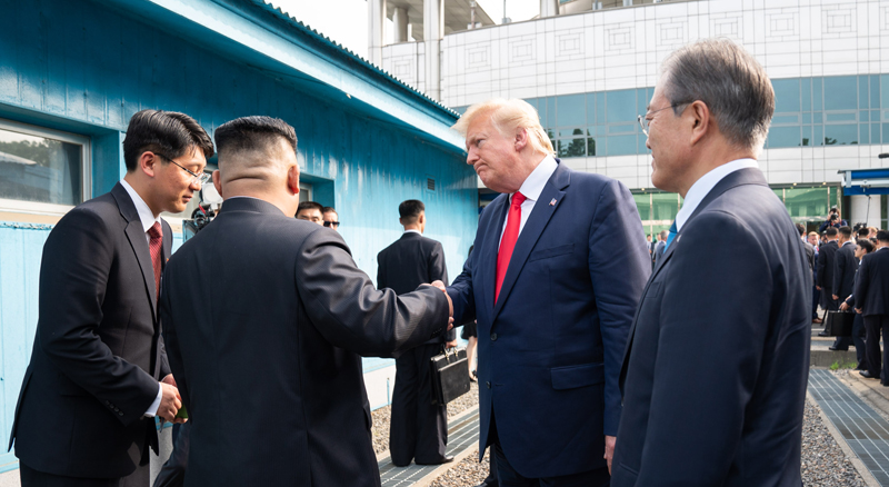 A historic meeting of the leaders of both Koreas and the U.S. occurs on June 30 at the truce village of Panmunjeom 66 years after the signing of the armistice that ended the Korean War in 1953.