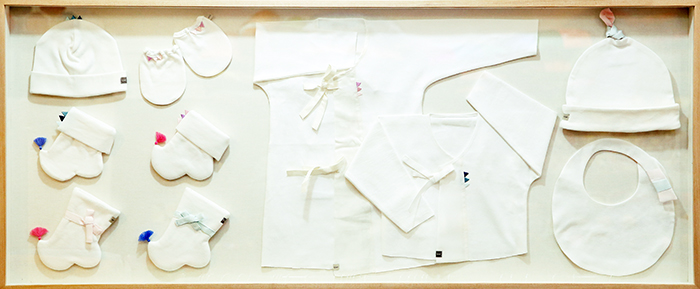 <i>Jogakbo</i> patterns can be seen in baby clothes. The triangle-shaped <i>jogakbo</i> pattern on the hem keeps away misfortune.