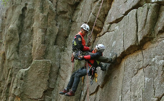 Instructors from the National Park School of Mountaineering Safety demonstrate emergency rappelling on October 29. 