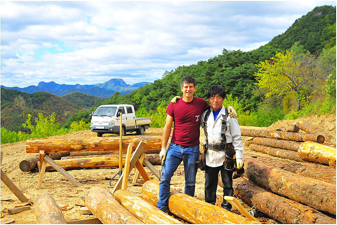 The new home taking shape on this farm is a testament to the owners’ creativity and love for nature, the skill of master builder (in white jacket), and the hard work of the three other Korean, Uzbek and Chinese men tasked with completing it in two months.