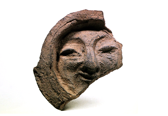 Roof-end Tile with Face Pattern. Silla. Gyeongju National Museum.