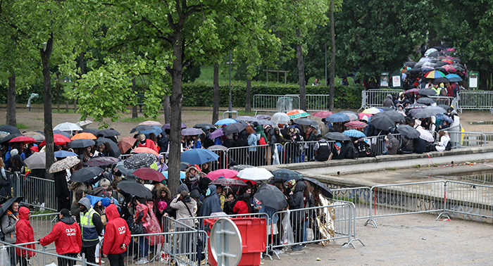 European K-pop fans show their love for the genre as they wait for two days in the rain for the KCON France 2016 festival to begin. Despite medium- to heavy-rain, they stayed awake all night, with some even setting up tents, waiting for the long-awaited concert to begin.