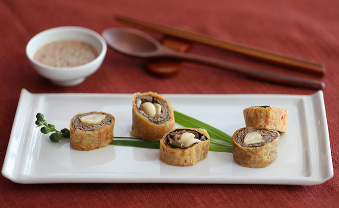 Garlic beef rolls, or <i>dangun shinhwajeon</i> in Korean, is a style of roll with beef, garlic and kimchi. The food is named after the story of Dangun, the mythical founder of the Korean people.