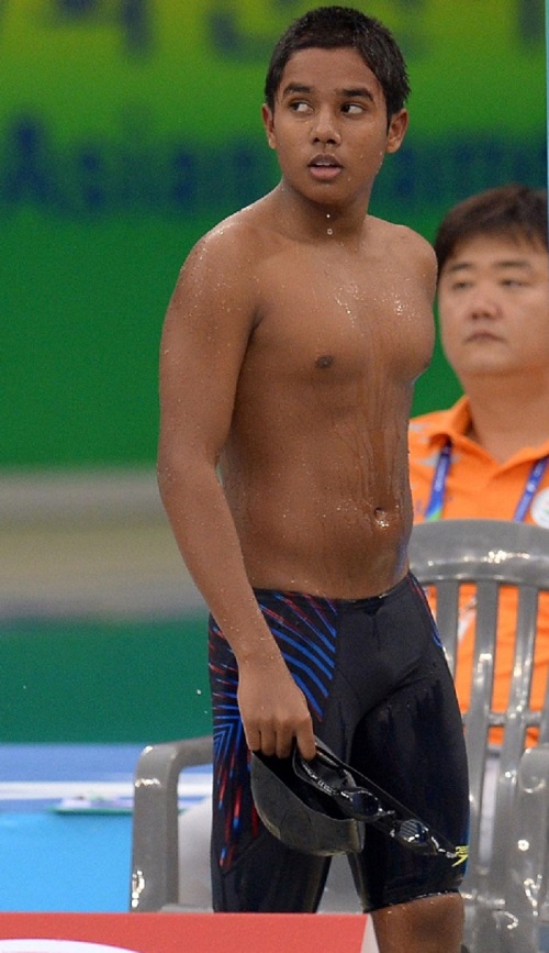 The Maldives’ Mubal Azzam Ibrahim competes in the heats for the men’s 400 meter freestyle event on September 22. He finishes last, two minutes behind China’s winner, Sun Yang. 