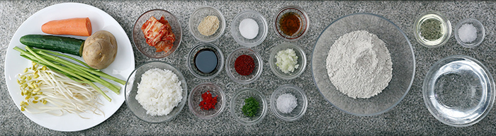 The main ingredients in potato bibimbap in buckwheat wraps are potatoes, buckwheat and kimchi.