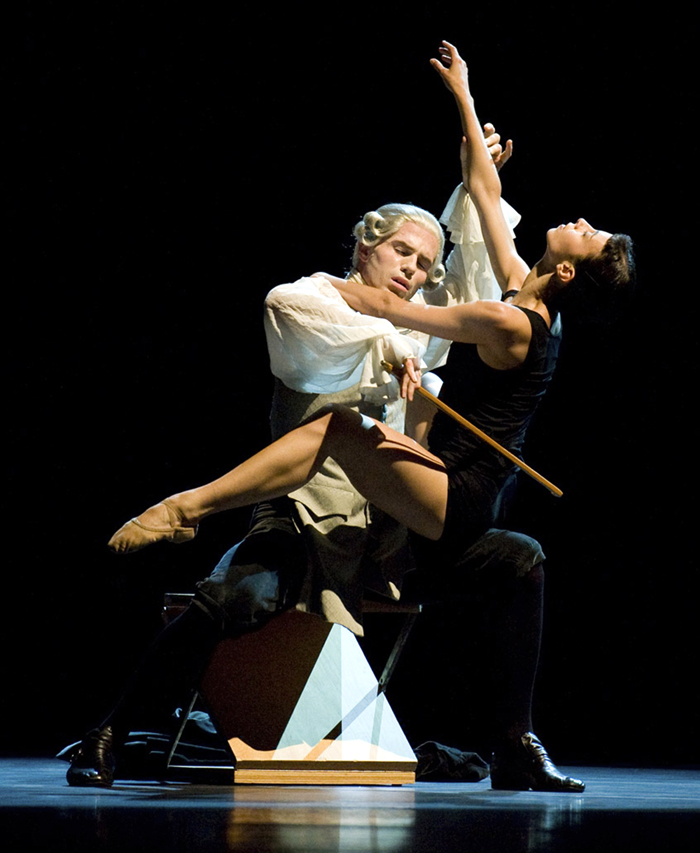 A male dancer portrays Bach playing a human cello in “Multiplicity, Forms of Silence and Emptiness.” (photo courtesy of Universal Ballet)
