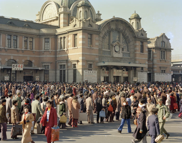 Seoul Station is packed with travelers trying to get home for the Lunar New Year's holidays in 1977.