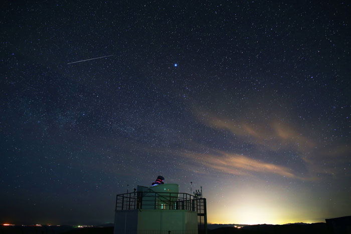 A day and night view of the Optical Wide-Field Patrol Mongolia Station. (photos courtesy of the KASI)
