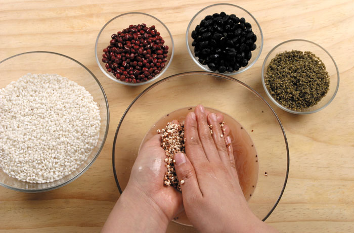 All of the grains used to make <i>ogokbap</i> need to be rinsed, soaked and dried before cooking. 