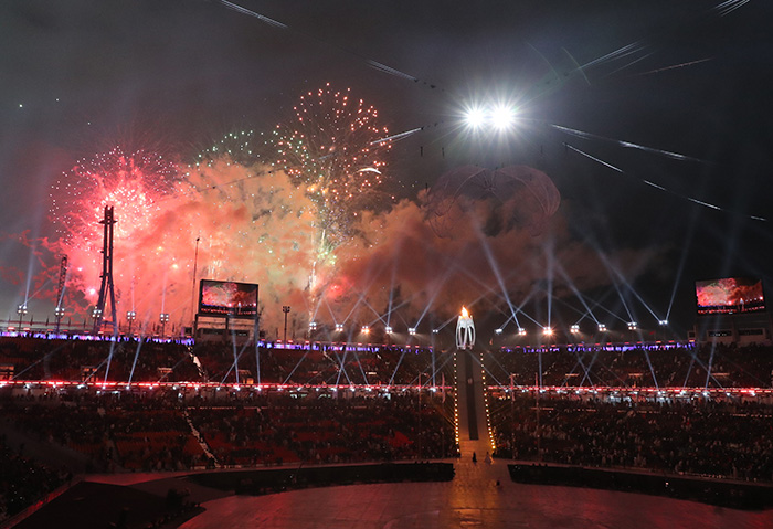 Fireworks celebrate the opening of the PyeongChang 2018 Paralympic Winter Games as the Paralympic flame lights up the torch platform during the Opening Ceremony at the PyeongChang Olympic Stadium on March 9. (Yonhap News)