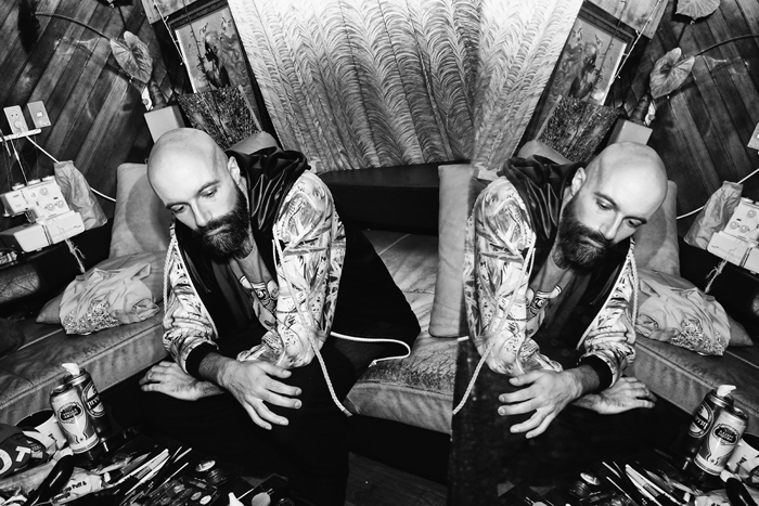 Caught in contemplation, model Antonio Blazevic waits for his shoot to begin.
