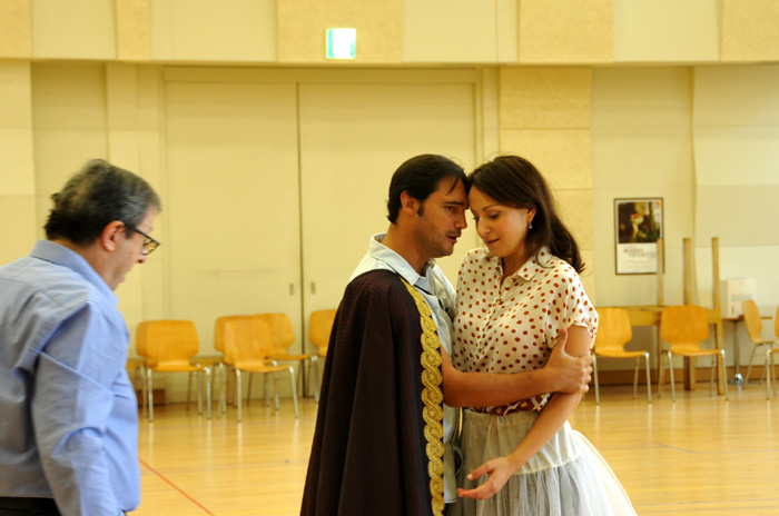 Tenor Francesco Demuro (center) and soprano Irina Lungu (right), who play Romeo and Juliet, rehearse for the upcoming opera “Romeo and Juliet,” under the guidance of director Elijah Moshinsky (left). 