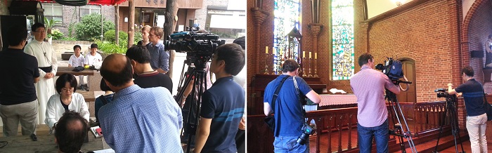 Part of Korea's foreign press corps shoots in the Yakhyun Catholic Church, the first-ever Western-style cathedral in Korea, on August 6. 