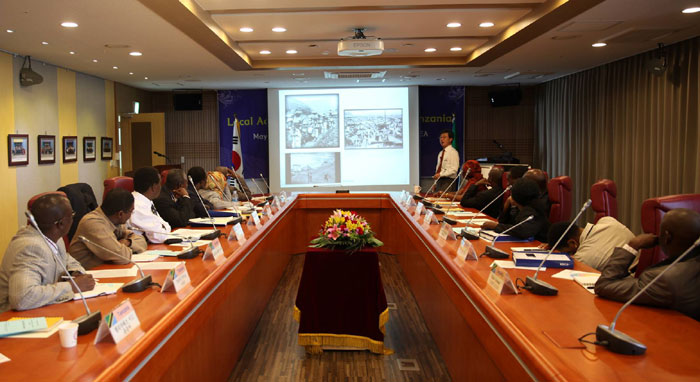 Tanzanian government officials watch a presentation as part of a workshop focusing on local administration management. (photo courtesy of the MSPA)