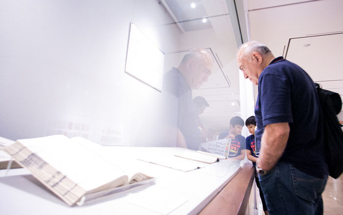 Turkish Ambassador to Korea Arslan Hakan Okcal studies the "<i>Uigwe</i>" collections from the Joseon Dynasty at the Kyujanggak Institute at Seoul National University. 