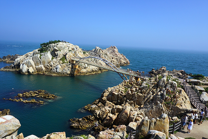 Trekkers along the Haeparang Trail's Course No. 8 enjoy the view from Daewangam Park in Ulsan.