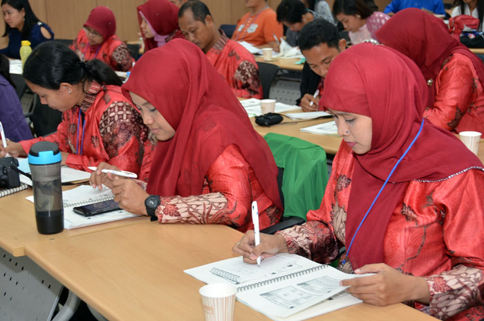 Participants in the Asia-Pacific Teacher Exchange for Global Education program attend a workshop.