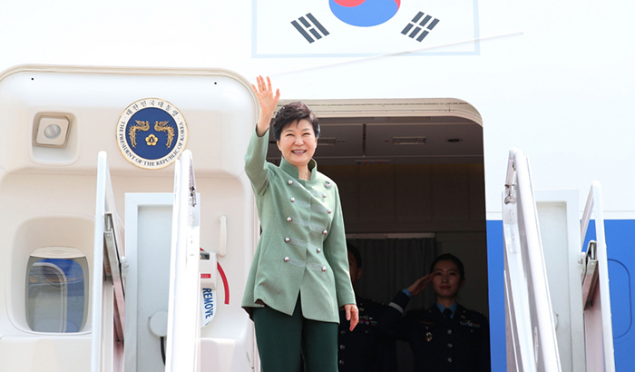 President Park Geun-hye waves as she departs the Seoul Air Base on May 1 to begin her state visit to Iran.