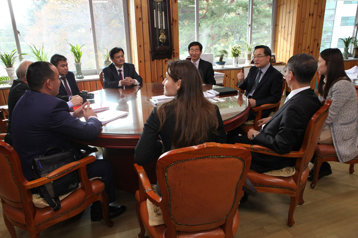 Participants in the International Workshop on Forest Ecological Restoration, Aral Sea discuss restoring the forested area around the diminished body of water. 