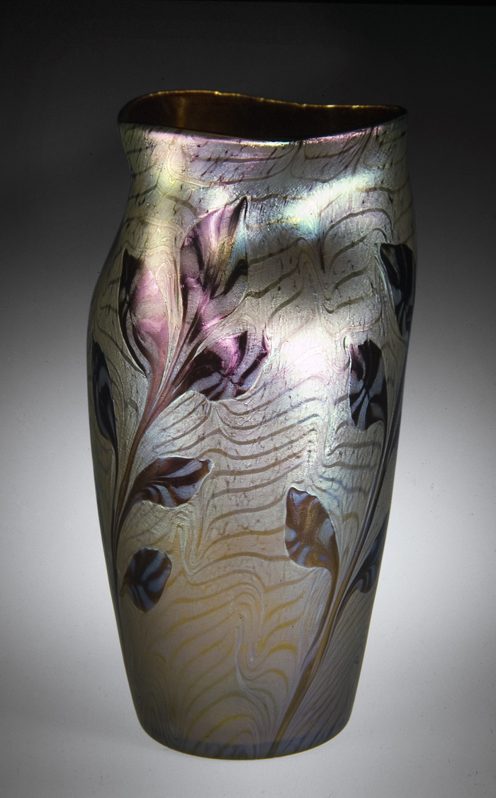 A vase is made in a Loetz glass factory in 1902. 