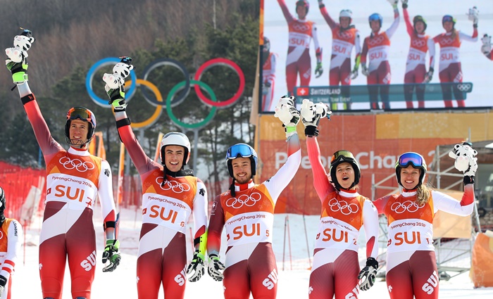 The Swiss skiers who won the gold medal shout for joy holding up the small Soohorang dolls, the official mascot, after the finals in the alpine skiing mixed team event at the PyeongChang 2018 Olympic Winter Games, held at the Yongpyong Alpine Center in Pyeongchang, Gangwon-do Province, on Feb. 24.