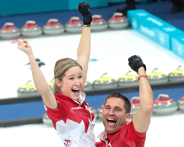 Canada's Kaitlyn Lawes and John Morris are delighted to win in the mixed double finals in curling at the Gangneung Curling Center on Feb. 13.